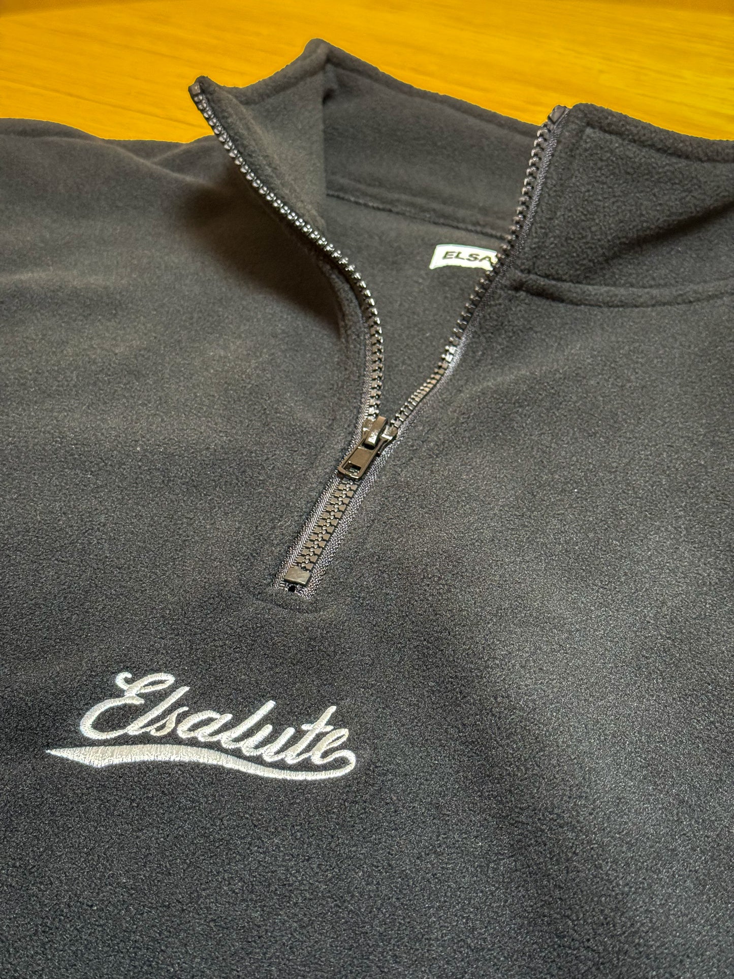 CURSIVE HALF ZIP FLEECE