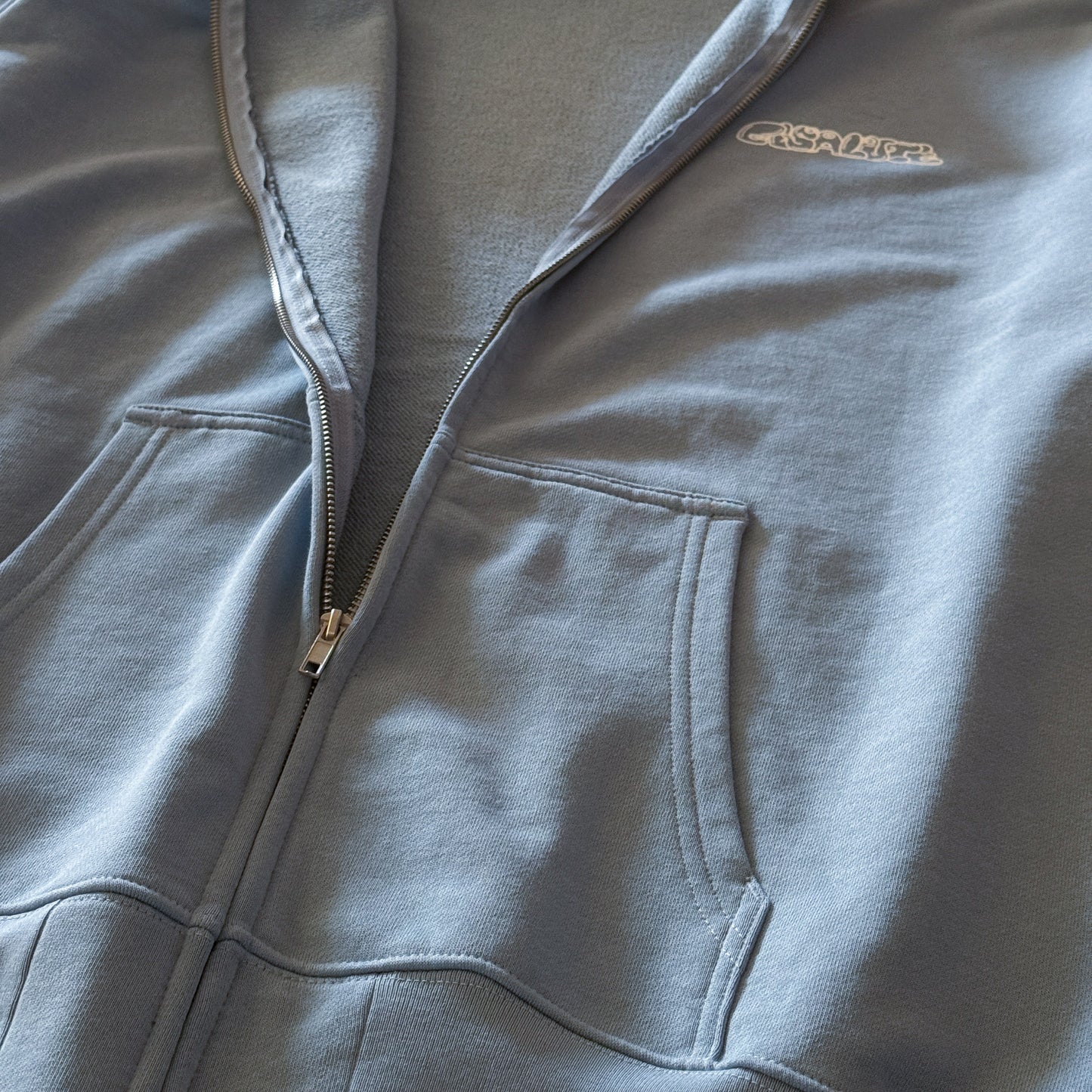 CHARACTER LOGO ZIPUP HOODIE